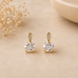 ARETES CON PIEDRA COLGANTE